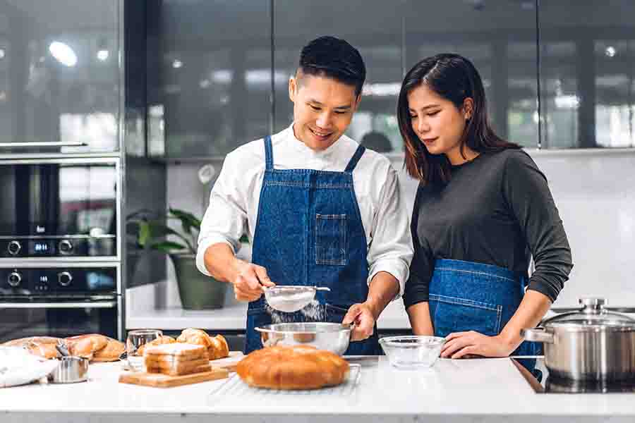 couple using chemistry to improve cooking session couple using chemistry to improve cooking session